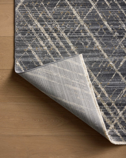 A stunning power-loomed 100% polyester area rug with abstract and linear detail, the Wade WAE-04 Midnight / Beige Area Rug features dramatic midnight and warm beige tones for a polished look