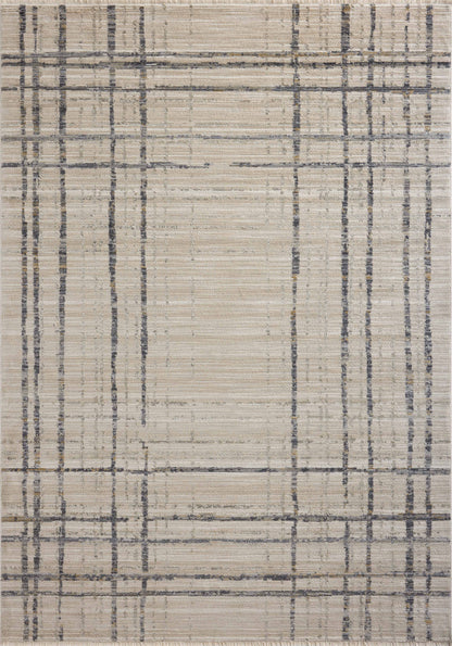 The Wade WAE-05 Beige / Midnight Area Rug delivers warm beige and dramatic midnight beauty and abstract and linear elegance in a power-loomed 100% polyester area rug