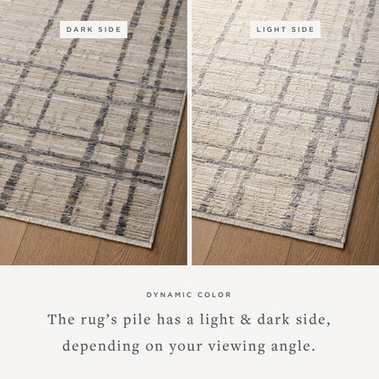 The Wade WAE-05 Beige / Midnight Area Rug delivers warm beige and dramatic midnight beauty and abstract and linear elegance in a power-loomed 100% polyester area rug
