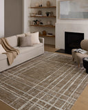 Designed with abstract and linear artistry in brown and grounding stone hues, the Wade WAE-05 Brown / Stone Area Rug is a power-loomed 100% polyester area rug that stands out