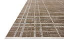 Designed with abstract and linear artistry in brown and grounding stone hues, the Wade WAE-05 Brown / Stone Area Rug is a power-loomed 100% polyester area rug that stands out