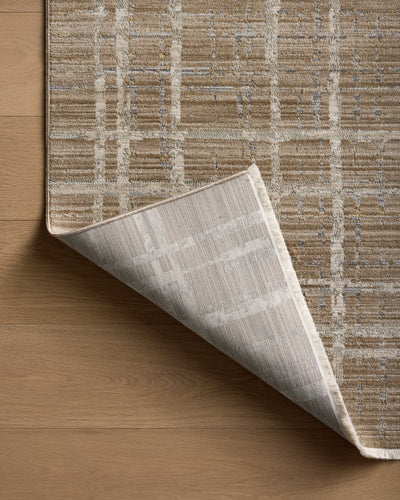 Designed with abstract and linear artistry in brown and grounding stone hues, the Wade WAE-05 Brown / Stone Area Rug is a power-loomed 100% polyester area rug that stands out