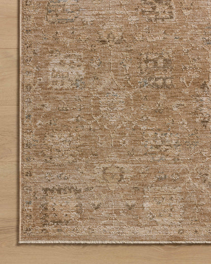 The Willa WIA-01 Clay / Multi Area Rug combines earthy clay and vibrant multi-toned tones and traditional and vintage patterns in a power-loomed 100% polyester area rug for effortless elegance