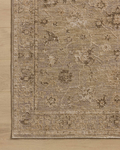 A power-loomed 100% polyester area rug featuring traditional and vintage design and versatile taupe and warm natural tones, the Willa WIA-02 Taupe / Natural Area Rug adds character to any room