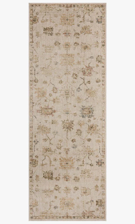 The Willa WIA-11 Bone / Multi Area Rug transforms any space with bone and vibrant multi-toned tones and traditional and vintage design in a power-loomed 100% polyester area rug