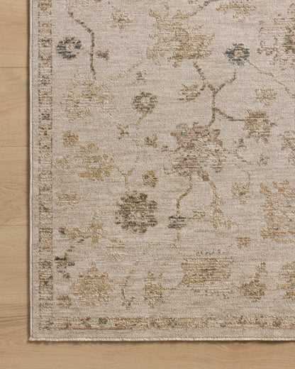 The Willa WIA-11 Bone / Multi Area Rug transforms any space with bone and vibrant multi-toned tones and traditional and vintage design in a power-loomed 100% polyester area rug