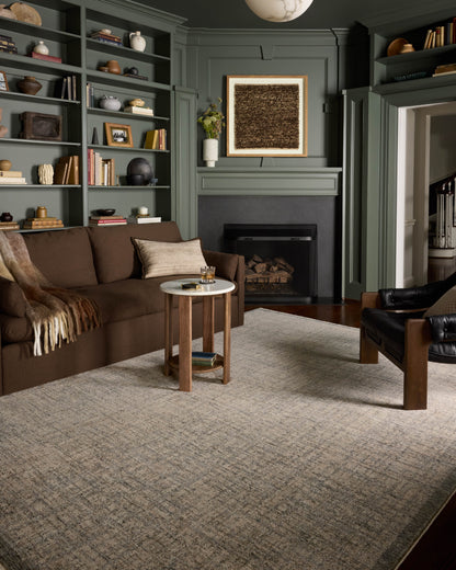 A power-loomed polyester area rug in casual denim and bone tones, the Winston WIT-01 Denim / Bone Area Rug grounds your room beautifully