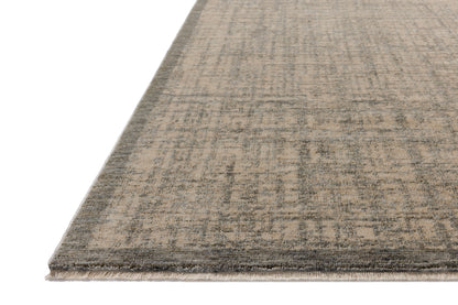 A power-loomed polyester area rug in casual denim and bone tones, the Winston WIT-01 Denim / Bone Area Rug grounds your room beautifully