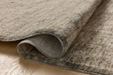 A power-loomed polyester area rug in casual denim and bone tones, the Winston WIT-01 Denim / Bone Area Rug grounds your room beautifully