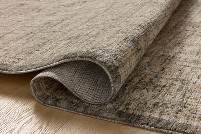 A power-loomed polyester area rug in casual denim and bone tones, the Winston WIT-01 Denim / Bone Area Rug grounds your room beautifully