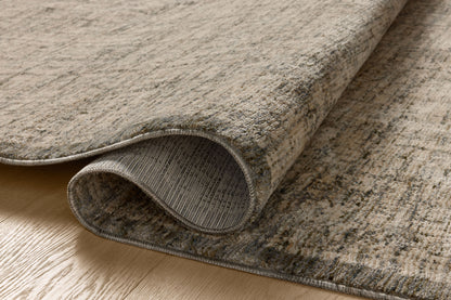 A power-loomed polyester area rug in casual denim and bone tones, the Winston WIT-01 Denim / Bone Area Rug grounds your room beautifully