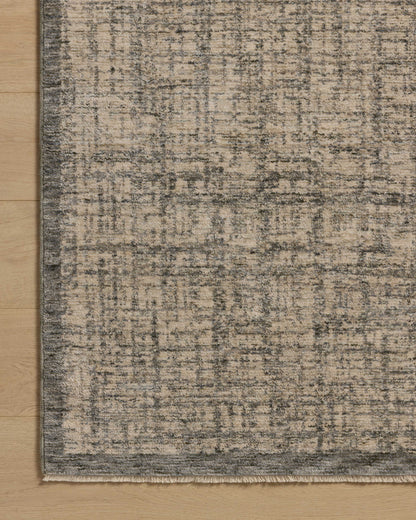 A power-loomed polyester area rug in casual denim and bone tones, the Winston WIT-01 Denim / Bone Area Rug grounds your room beautifully