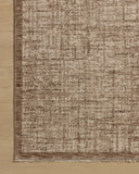 The Winston WIT-01 Earth / Bone Area Rug is a power-loomed polyester area rug that radiates earthy and bone charm