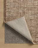 The Winston WIT-01 Earth / Bone Area Rug is a power-loomed polyester area rug that radiates earthy and bone charm