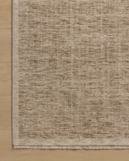 The Winston WIT-01 Taupe / Bone Area Rug showcases versatile taupe and bone tones in a power-loomed polyester area rug