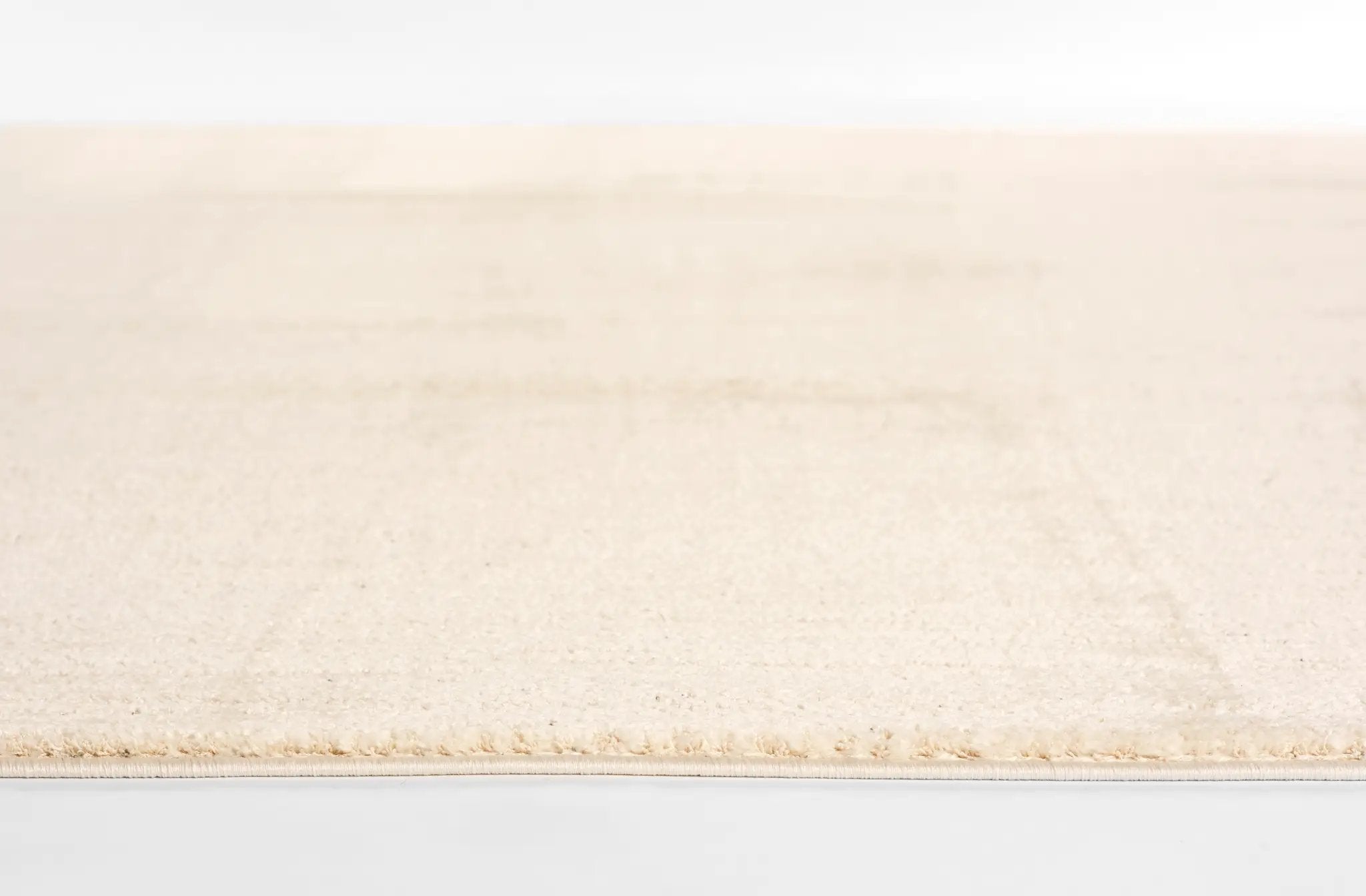Wren WRE-5 Ivory Area Rug by Momeni