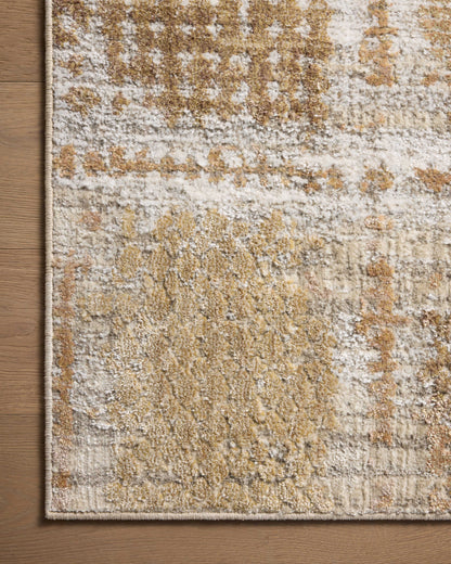 Expertly crafted as a power-loomed polypropylene and polyester area rug with distressed artistry, the Wyatt WYA-05 Adobe / Dove Area Rug captures adobe and gentle dove tones beautifully