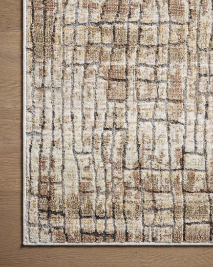 Finished in earthy clay and smoky tones with distressed styling, the Wyatt WYA-07 Clay / Smoke Area Rug is a power-loomed polypropylene and polyester area rug for modern living