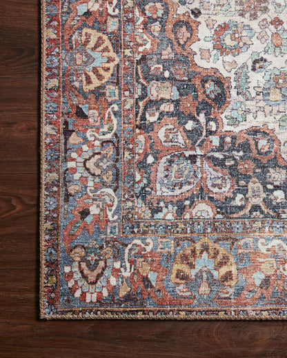 A power-loomed 100% polyester area rug in bold red and vibrant multi-toned hues, the Wynter WYN-01 Red / Multi Area Rug is a standout in any décor