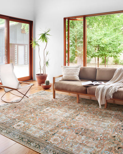 The Wynter WYN-02 Auburn / Multi Area Rug highlights auburn and vibrant multi-toned tones in a beautifully made power-loomed 100% polyester area rug