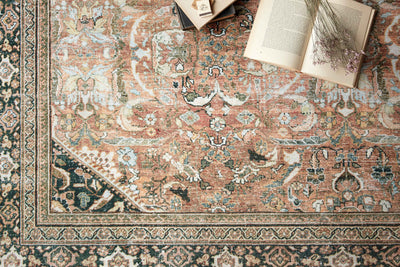 The Wynter WYN-02 Auburn / Multi Area Rug highlights auburn and vibrant multi-toned tones in a beautifully made power-loomed 100% polyester area rug