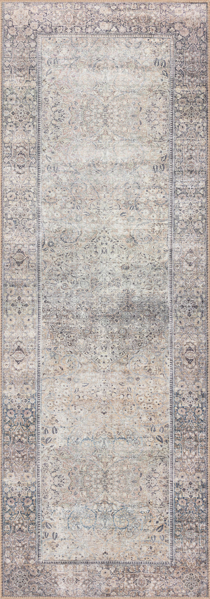 Dressed in shimmering silver and deep charcoal hues, the Wynter WYN-03 Silver / Charcoal Area Rug is a power-loomed 100% polyester area rug that completes any room