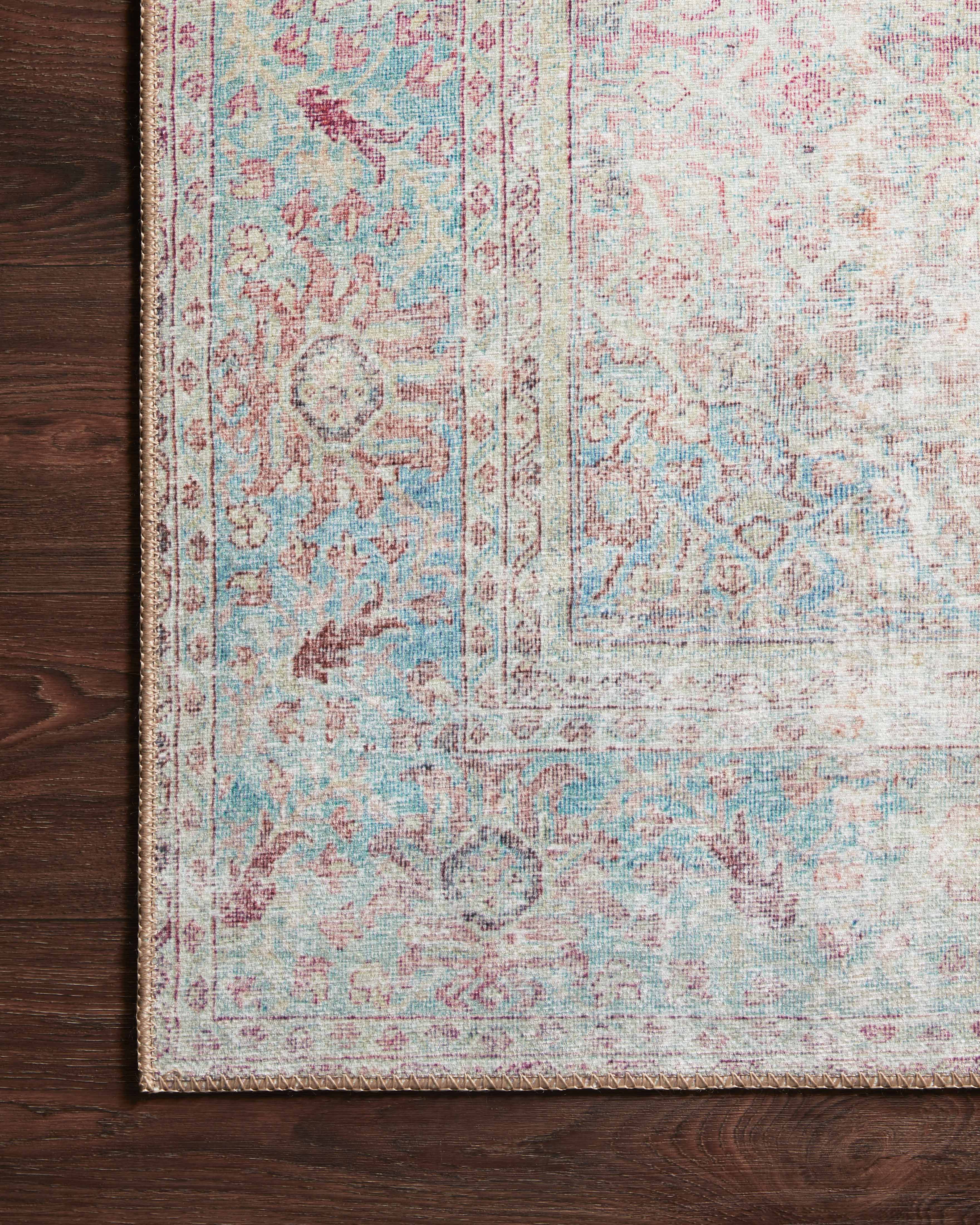 The Wynter WYN-04 Red / Teal Area Rug transforms any space with bold red and vibrant teal tones in a power-loomed 100% polyester area rug