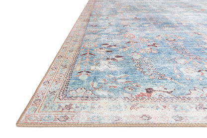 The Wynter WYN-06 Teal / Multi Area Rug is a power-loomed 100% polyester area rug that radiates vibrant teal and vibrant multi-toned charm