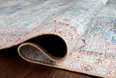 The Wynter WYN-06 Teal / Multi Area Rug is a power-loomed 100% polyester area rug that radiates vibrant teal and vibrant multi-toned charm