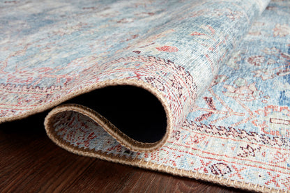 The Wynter WYN-06 Teal / Multi Area Rug is a power-loomed 100% polyester area rug that radiates vibrant teal and vibrant multi-toned charm