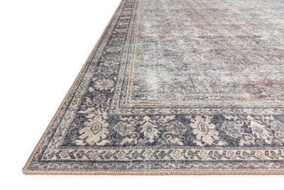 Layered in elegant grey and deep charcoal hues, the Wynter WYN-07 Grey / Charcoal Area Rug is a power-loomed 100% polyester area rug perfect for any setting