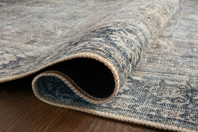 Layered in elegant grey and deep charcoal hues, the Wynter WYN-07 Grey / Charcoal Area Rug is a power-loomed 100% polyester area rug perfect for any setting