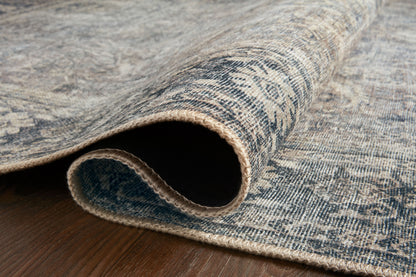 Layered in elegant grey and deep charcoal hues, the Wynter WYN-07 Grey / Charcoal Area Rug is a power-loomed 100% polyester area rug perfect for any setting