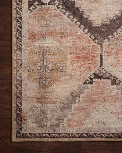 The Wynter WYN-08 Graphite / Blush Area Rug showcases graphite and delicate blush tones in a power-loomed 100% polyester area rug