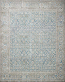 A power-loomed 100% polyester area rug in serene ocean and shimmering silver tones, the Wynter WYN-10 Ocean / Silver Area Rug anchors any room