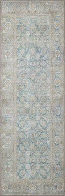A power-loomed 100% polyester area rug in serene ocean and shimmering silver tones, the Wynter WYN-10 Ocean / Silver Area Rug anchors any room