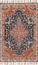 The Zharah ZR-01 Navy / Multi Area Rug pairs classic navy and vibrant multi-toned tones with a hooked 100% wool area rug for lasting style