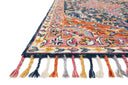 The Zharah ZR-01 Navy / Multi Area Rug pairs classic navy and vibrant multi-toned tones with a hooked 100% wool area rug for lasting style
