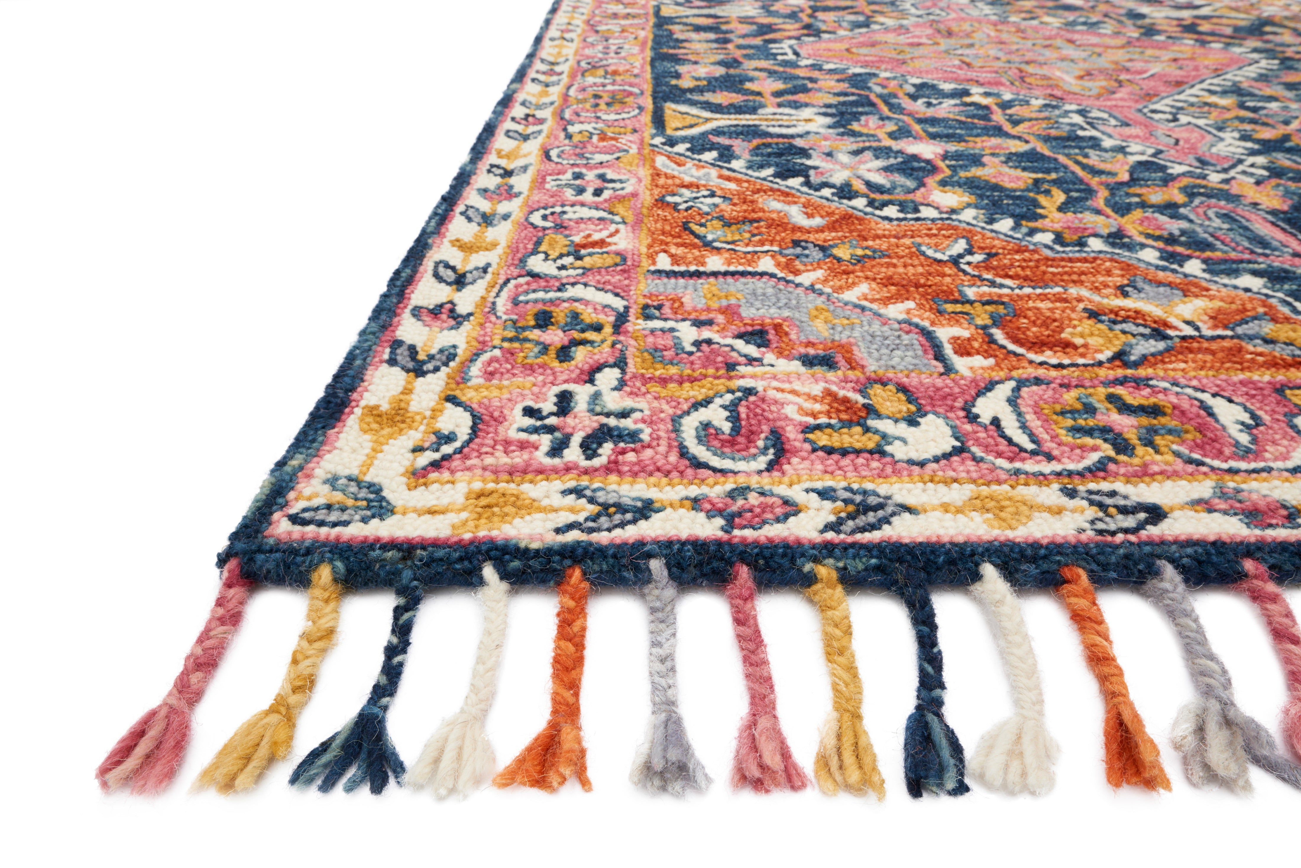 The Zharah ZR-01 Navy / Multi Area Rug pairs classic navy and vibrant multi-toned tones with a hooked 100% wool area rug for lasting style