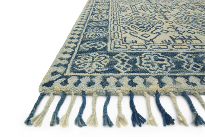 A hooked 100% wool area rug with soft misty and calming blue tones, the Zharah ZR-09 Mist / Blue Area Rug adds character to any room