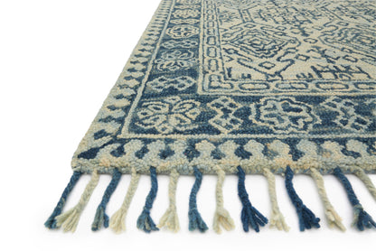 A hooked 100% wool area rug with soft misty and calming blue tones, the Zharah ZR-09 Mist / Blue Area Rug adds character to any room