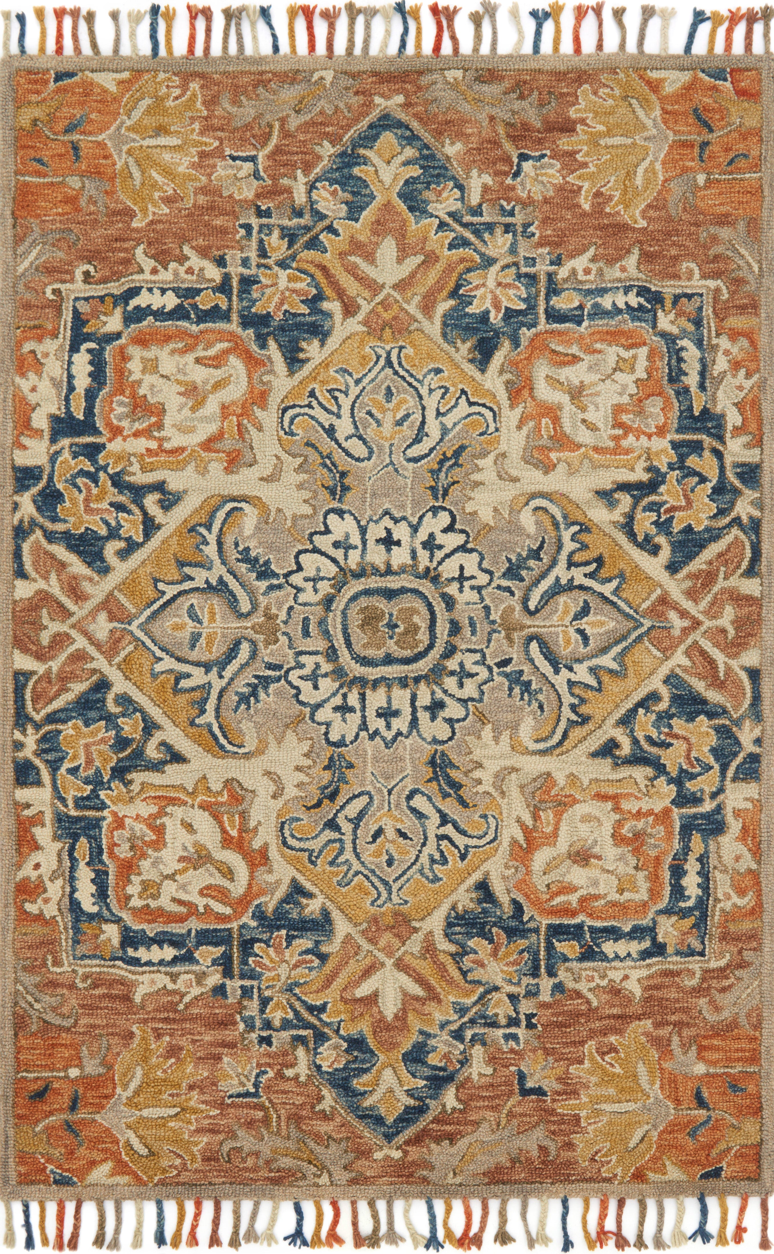 Rich in warm rust and calming blue hues, the Zharah ZR-10 Rust / Blue Area Rug is a hooked 100% wool area rug built for style and comfort
