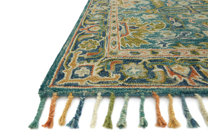 Expertly crafted as a hooked 100% wool area rug, the Zharah ZR-12 Blue / Navy Area Rug captures calming blue and classic navy tones beautifully