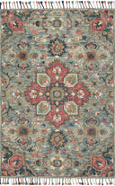 The Zharah ZR-13 Light Blue / Multi Area Rug brings light blue and vibrant multi-toned character to your home in a hooked 100% wool area rug