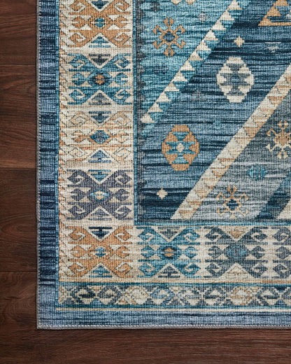 A power-loomed 100% polyester area rug in serene ocean and radiant gold hues, the Zion ZIO-02 Ocean / Gold Area Rug is a standout in any décor