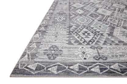 The Zion ZIO-03 Charcoal / Slate Area Rug highlights deep charcoal and cool slate tones in a beautifully made power-loomed 100% polyester area rug
