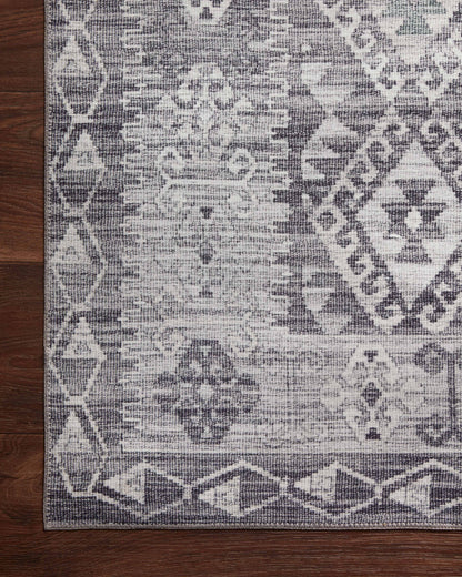 The Zion ZIO-03 Charcoal / Slate Area Rug highlights deep charcoal and cool slate tones in a beautifully made power-loomed 100% polyester area rug
