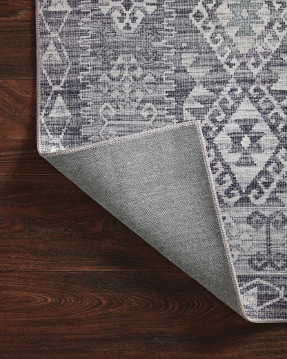 The Zion ZIO-03 Charcoal / Slate Area Rug highlights deep charcoal and cool slate tones in a beautifully made power-loomed 100% polyester area rug