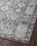 The Zion ZIO-03 Charcoal / Slate Area Rug highlights deep charcoal and cool slate tones in a beautifully made power-loomed 100% polyester area rug