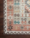 Dressed in refined ivory and vibrant multi-toned hues, the Zion ZIO-04 Ivory / Multi Area Rug is a power-loomed 100% polyester area rug that completes any room